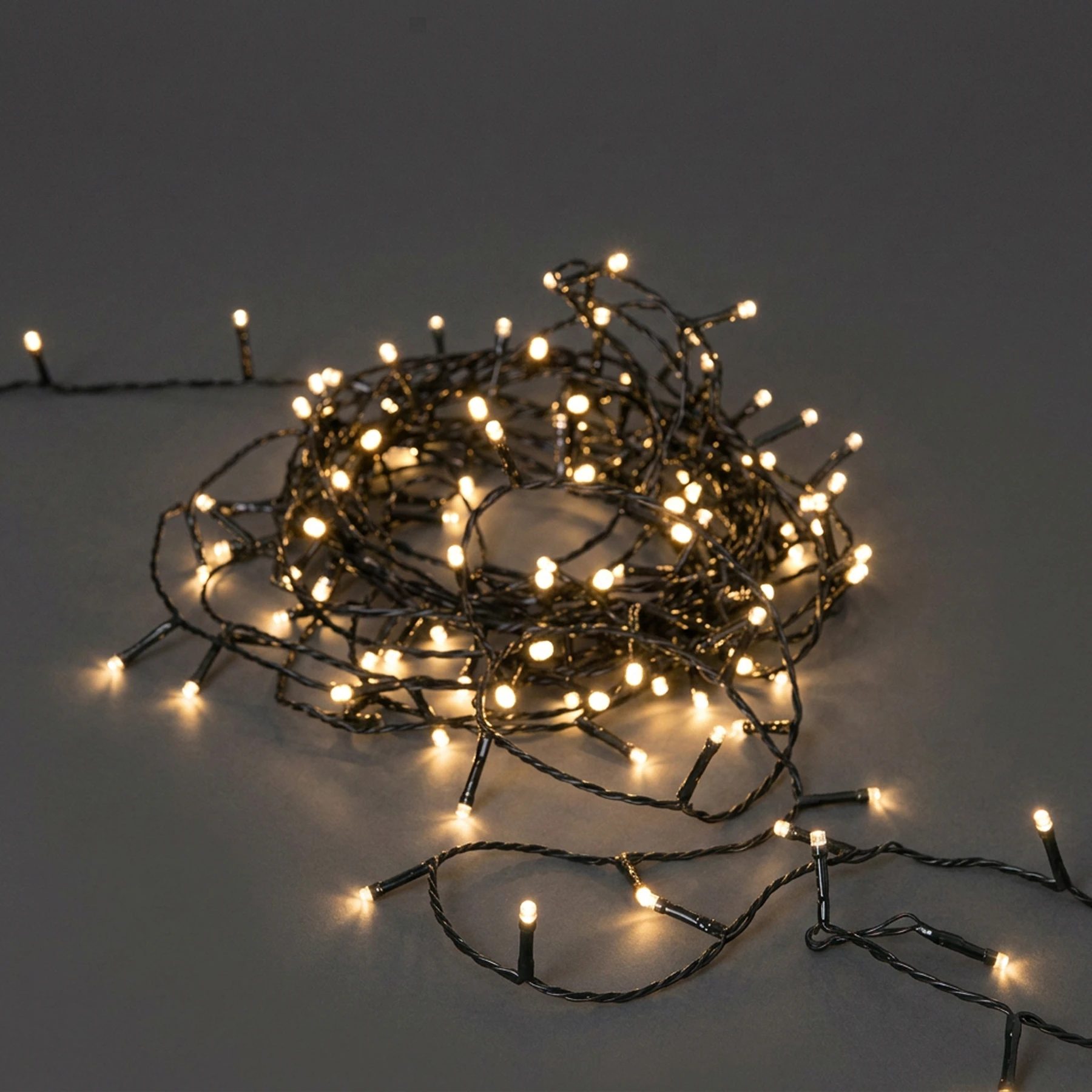 Flashy - Lichterkette für außen - 21 m - 300 LEDs - Timer - Netzbetrieb - 8 Funktionen - Warmweiß