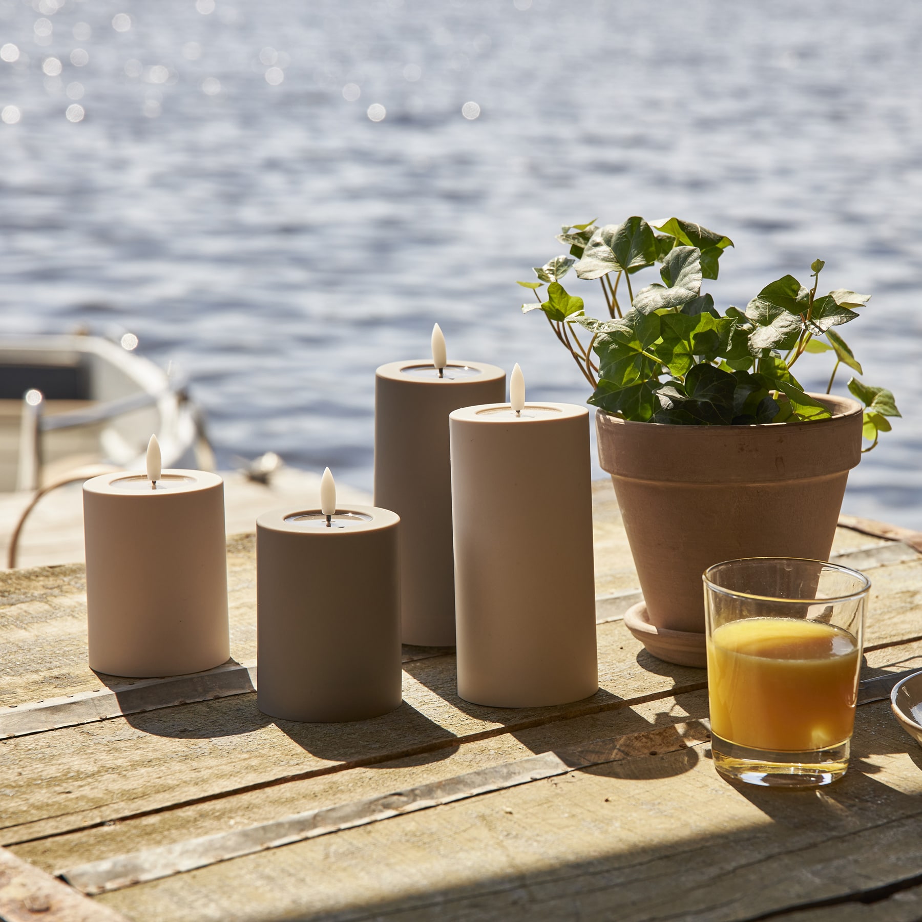 Flamme Soft - Kerze für außen - Beige - Höhe: 12,5 cm - Batteriebetrieb - Timer - flackernd